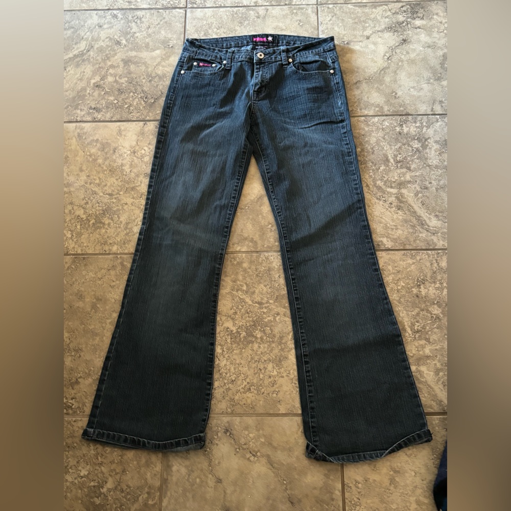 These are a rare find, vintage bubblegum jeans with skull detail on back pocket